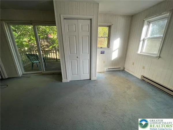 an empty room with windows