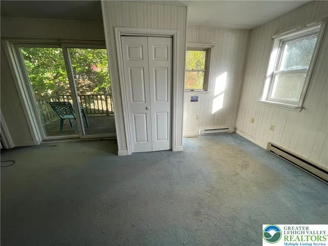 an empty room with windows