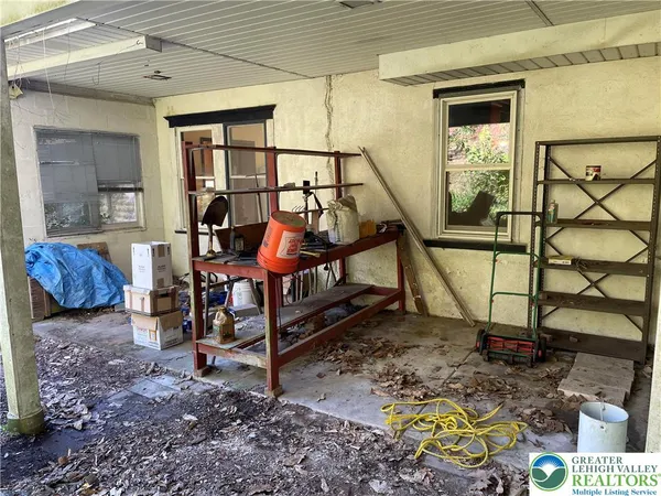 a view of swimming pool with a yard