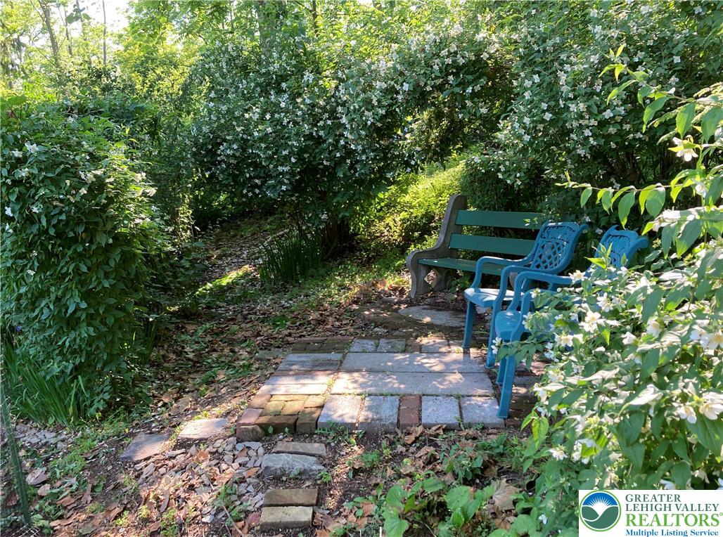 7007 Bausch Road New Tripoli, PA 18066 - Photo 35 of 36 a backyard of a house with lots of green space