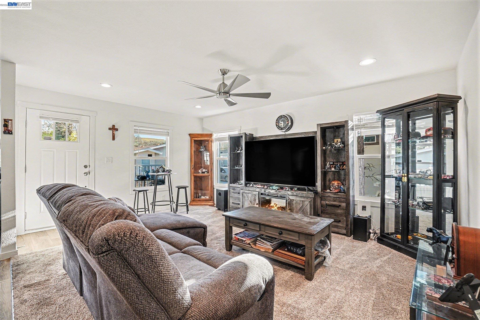 16711 Marsh Creek Road, Unit 150 Clayton, CA 94517 - Photo 2 of 19 a living room with furniture and a flat screen tv