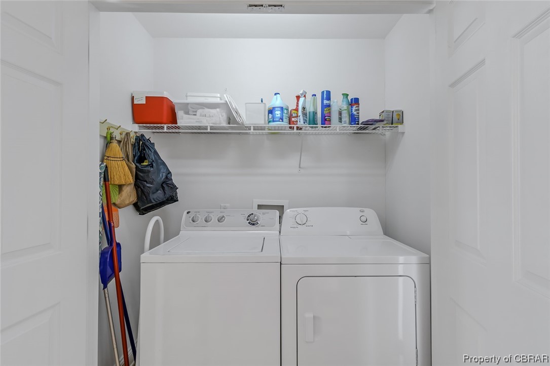 1243 Fox Point Road Reedville, VA 22539 - Photo 43 of 44 Laundry room featuring washer hookup and separate washer and dryer