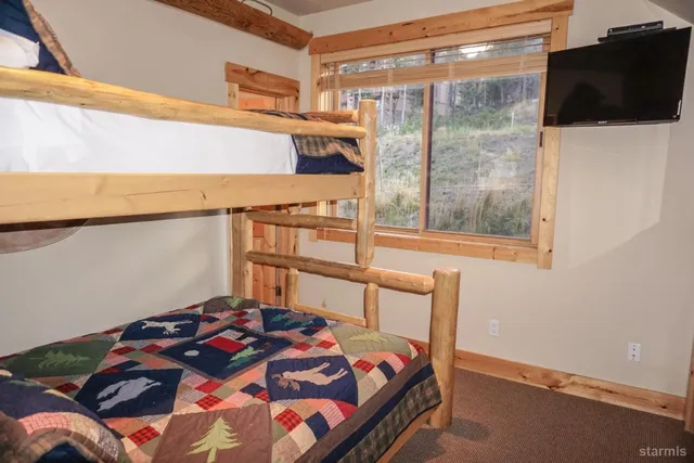 an outdoor sitting area with chairs and tables