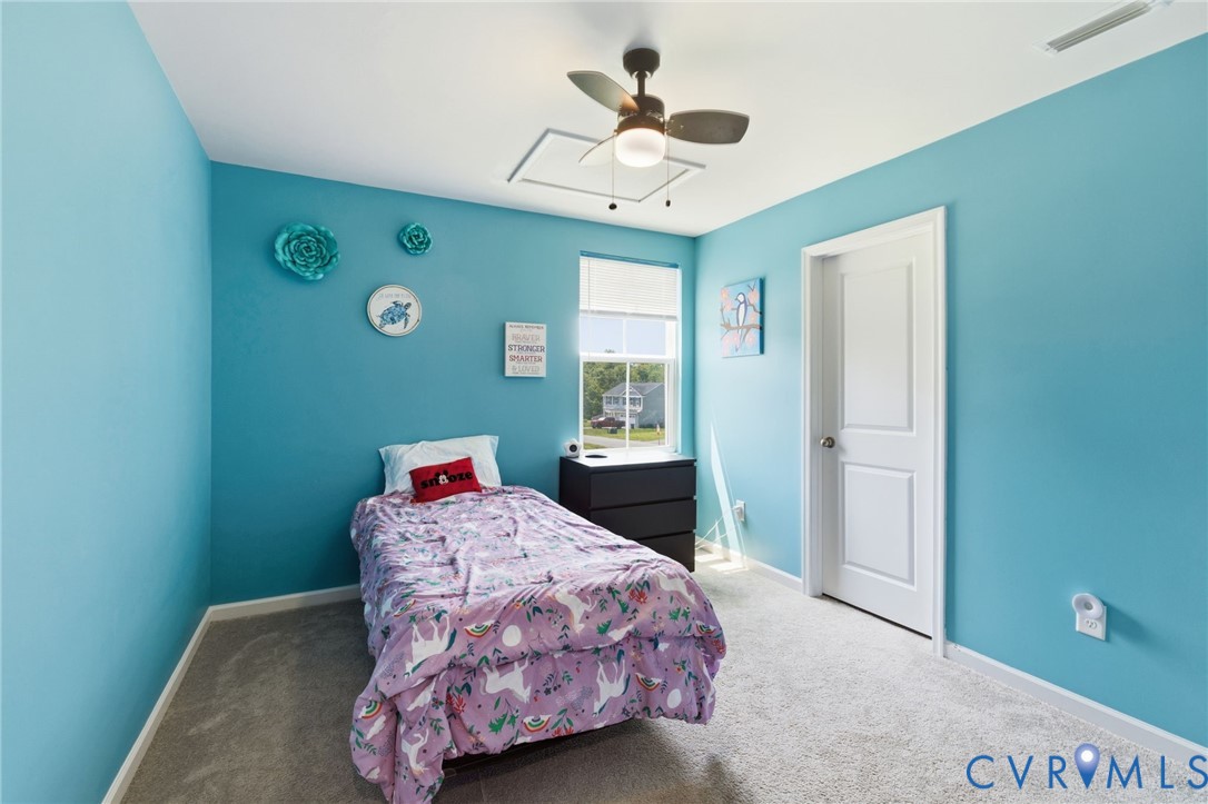 6801 Oakfork Loop New Kent, VA 23124 - Photo 14 of 28 Carpeted flooring, ceiling fan, natural light, and