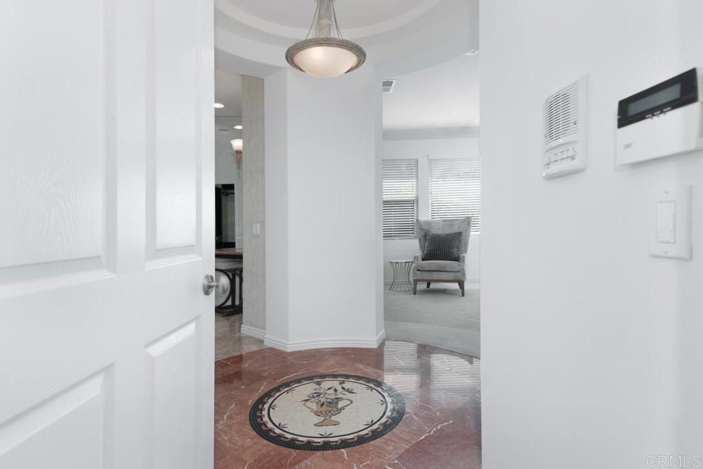 5473 Valerio Trail San Diego, CA 92130 - Photo 19 of 39 a bathroom with a sink and a mirror