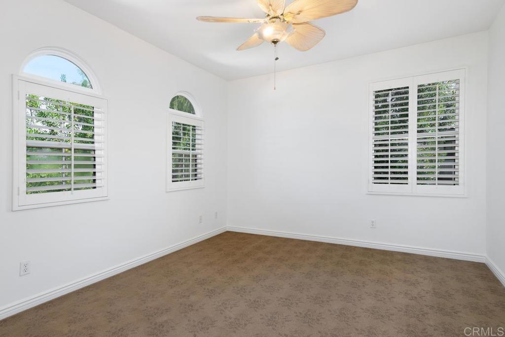 5473 Valerio Trail San Diego, CA 92130 - Photo 26 of 39 a view of an empty room with a window