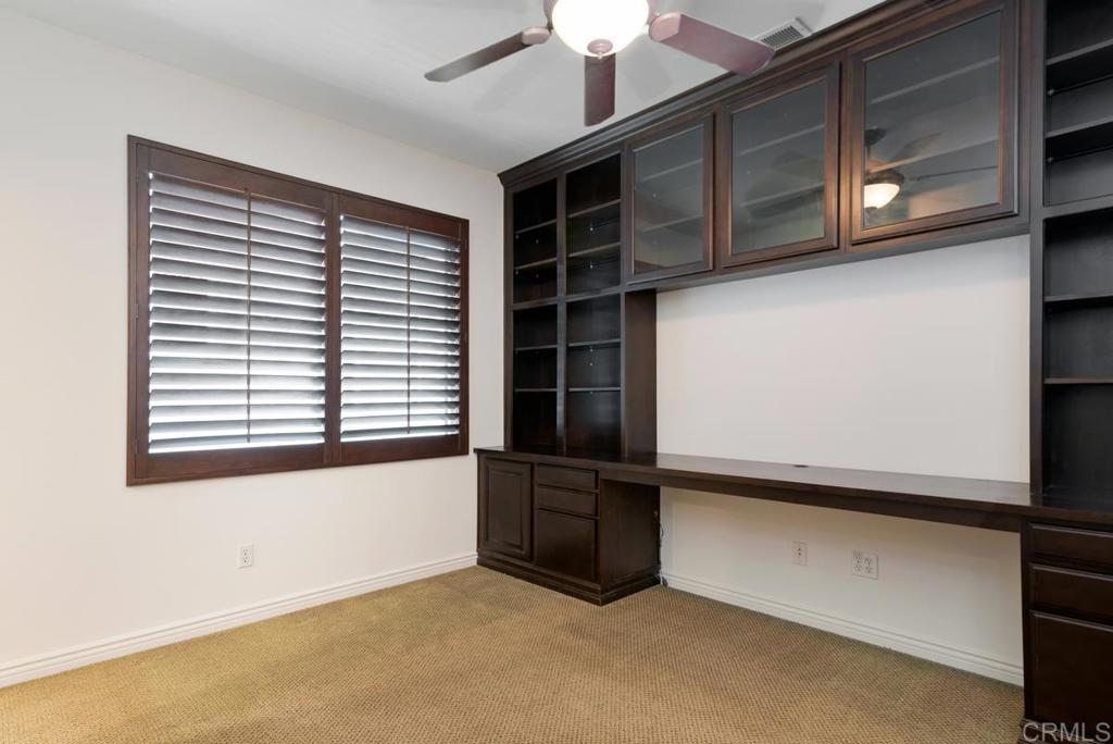 5473 Valerio Trail San Diego, CA 92130 - Photo 29 of 39 a view of an empty room with a window