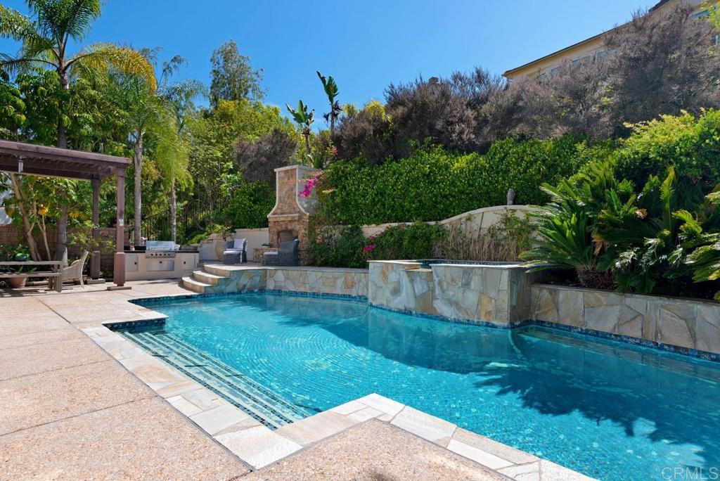 5473 Valerio Trail San Diego, CA 92130 - Photo 33 of 39 a view of backyard with plants and outdoor seating