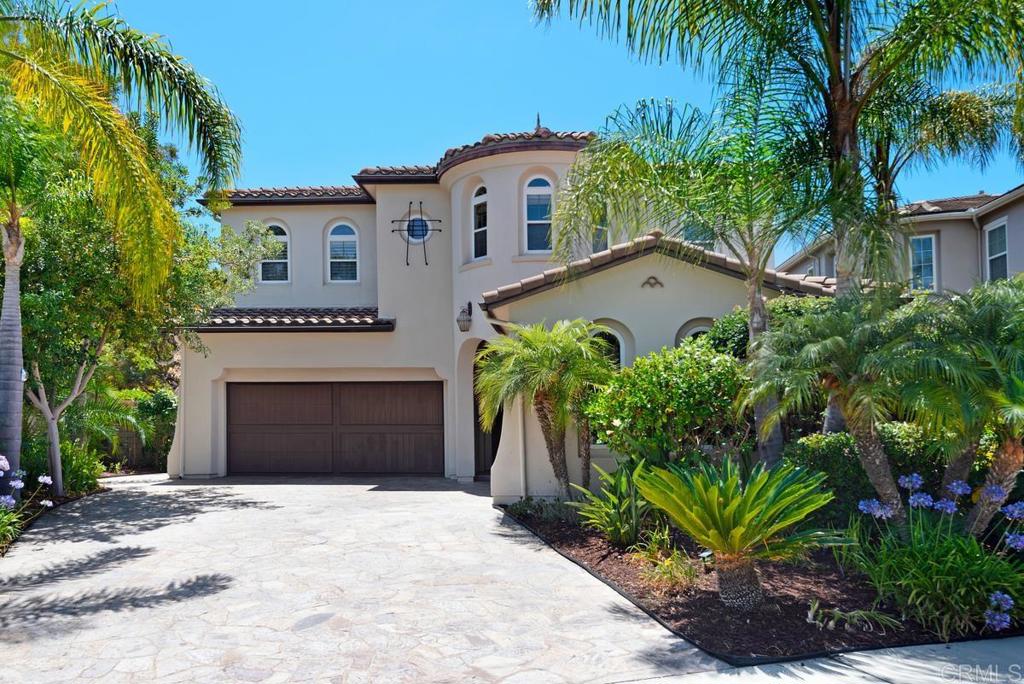 5473 Valerio Trail San Diego, CA 92130 - Photo 38 of 39 a front view of a house with a garden