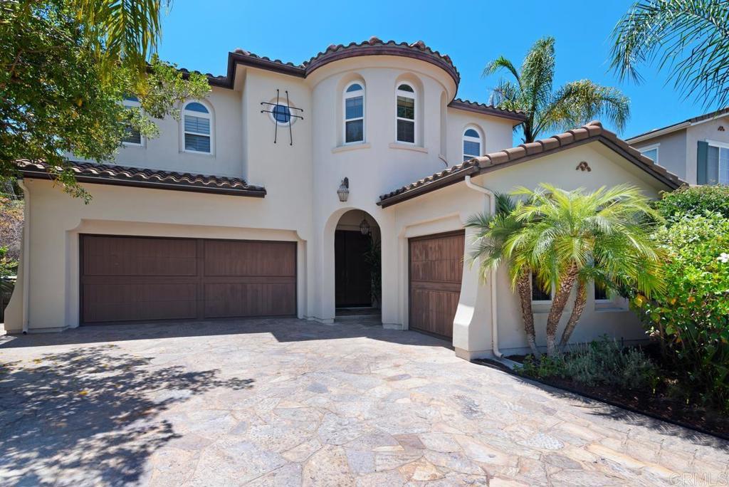 5473 Valerio Trail San Diego, CA 92130 - Photo 39 of 39 a front view of a house with a yard
