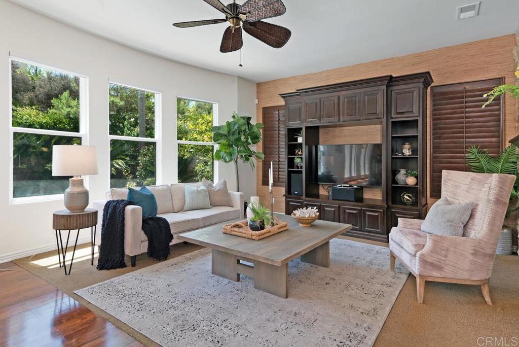 5473 Valerio Trail San Diego, CA 92130 - Photo 6 of 39 a living room with furniture and a large window