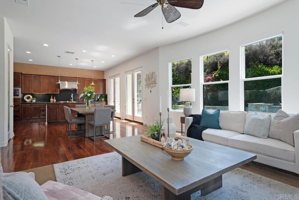 5473 Valerio Trail San Diego, CA 92130 - Photo 9 of 39 a living room with furniture and a large window