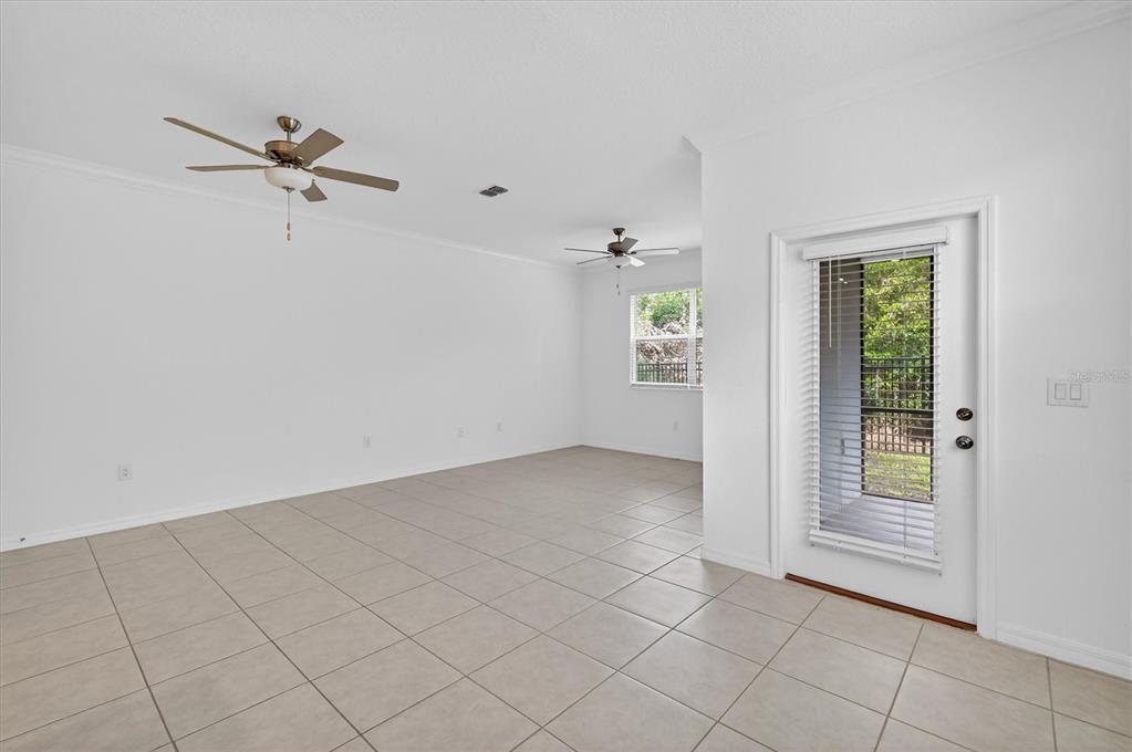 6956 Ripple Pond Loop Zephyrhills, FL 33541 - Photo 11 of 30 a view of an empty room with a window