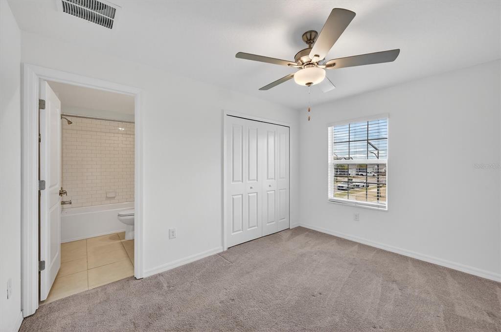 6956 Ripple Pond Loop Zephyrhills, FL 33541 - Photo 27 of 30 a view of an empty room with a window