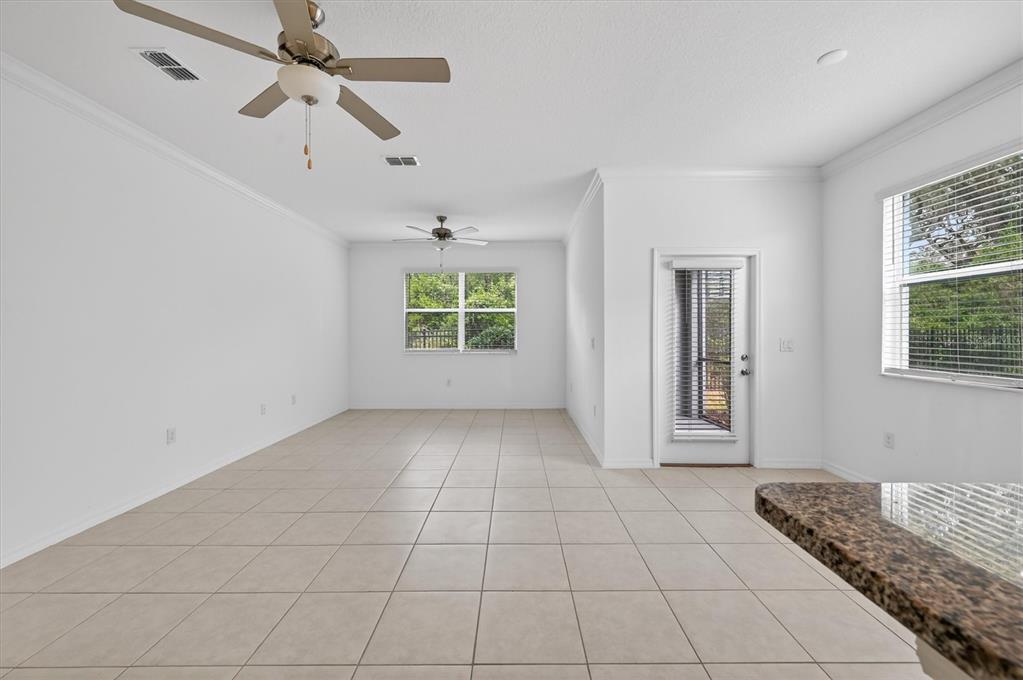 6956 Ripple Pond Loop Zephyrhills, FL 33541 - Photo 10 of 30 a view of an empty room with a window