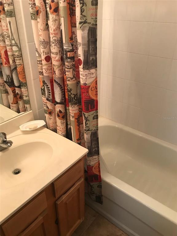 26386 Nadir Road, Unit 401 Punta Gorda, FL 33983 - Photo 26 of 42 a bathroom with a sink and a bathtub