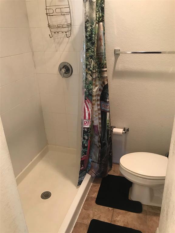 26386 Nadir Road, Unit 401 Punta Gorda, FL 33983 - Photo 38 of 42 a bathroom with a sink and a shower