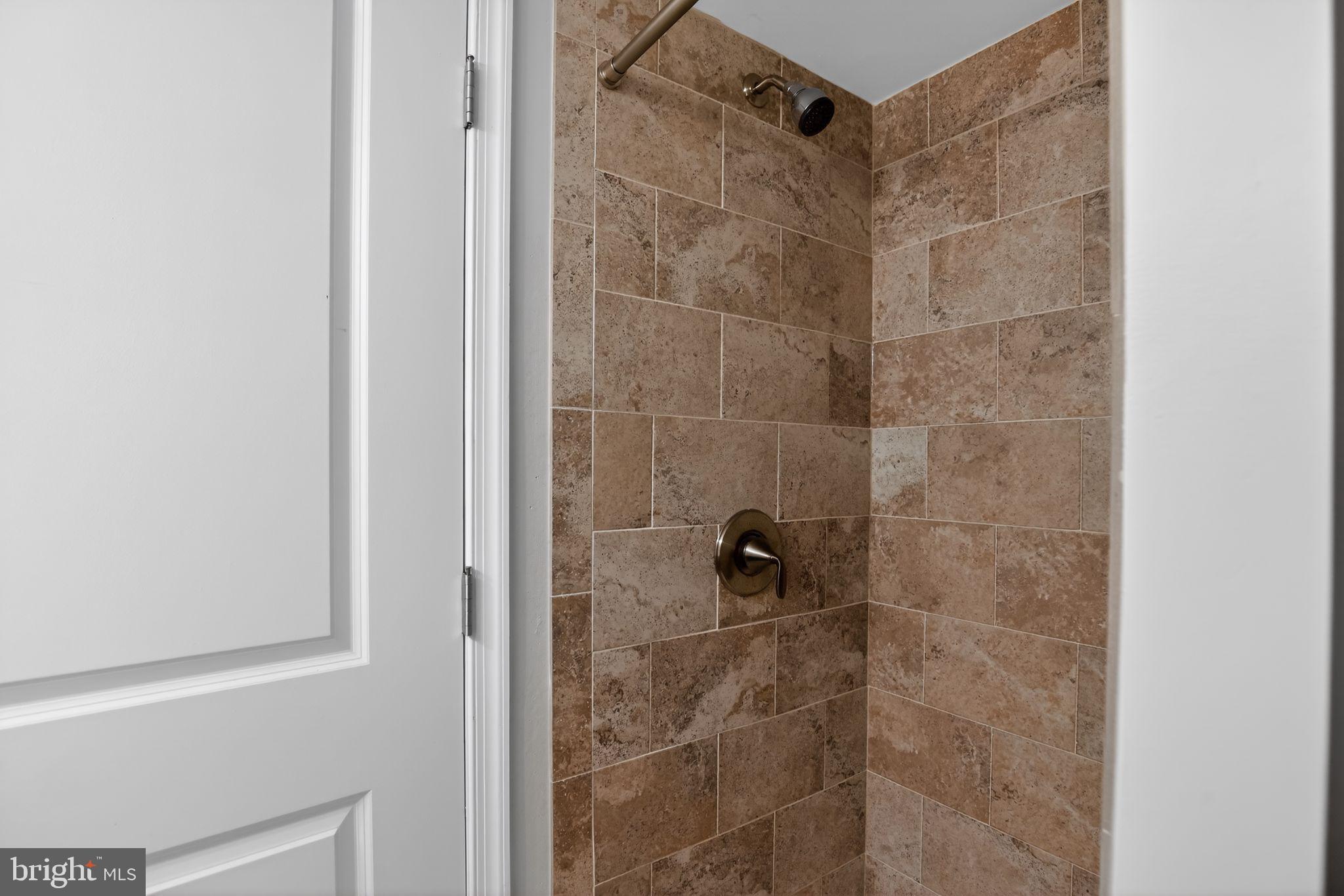 6843 Dunbar Road Baltimore, MD 21222 - Photo 22 of 27 a bathroom with a shower