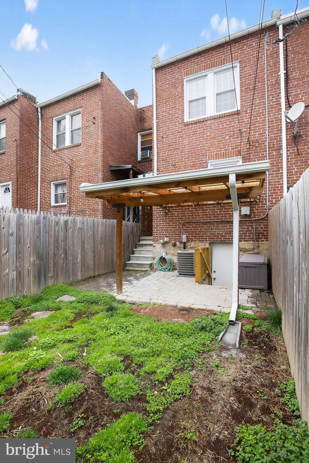 6843 Dunbar Road Baltimore, MD 21222 - Photo 27 of 27 a front view of a house with garden