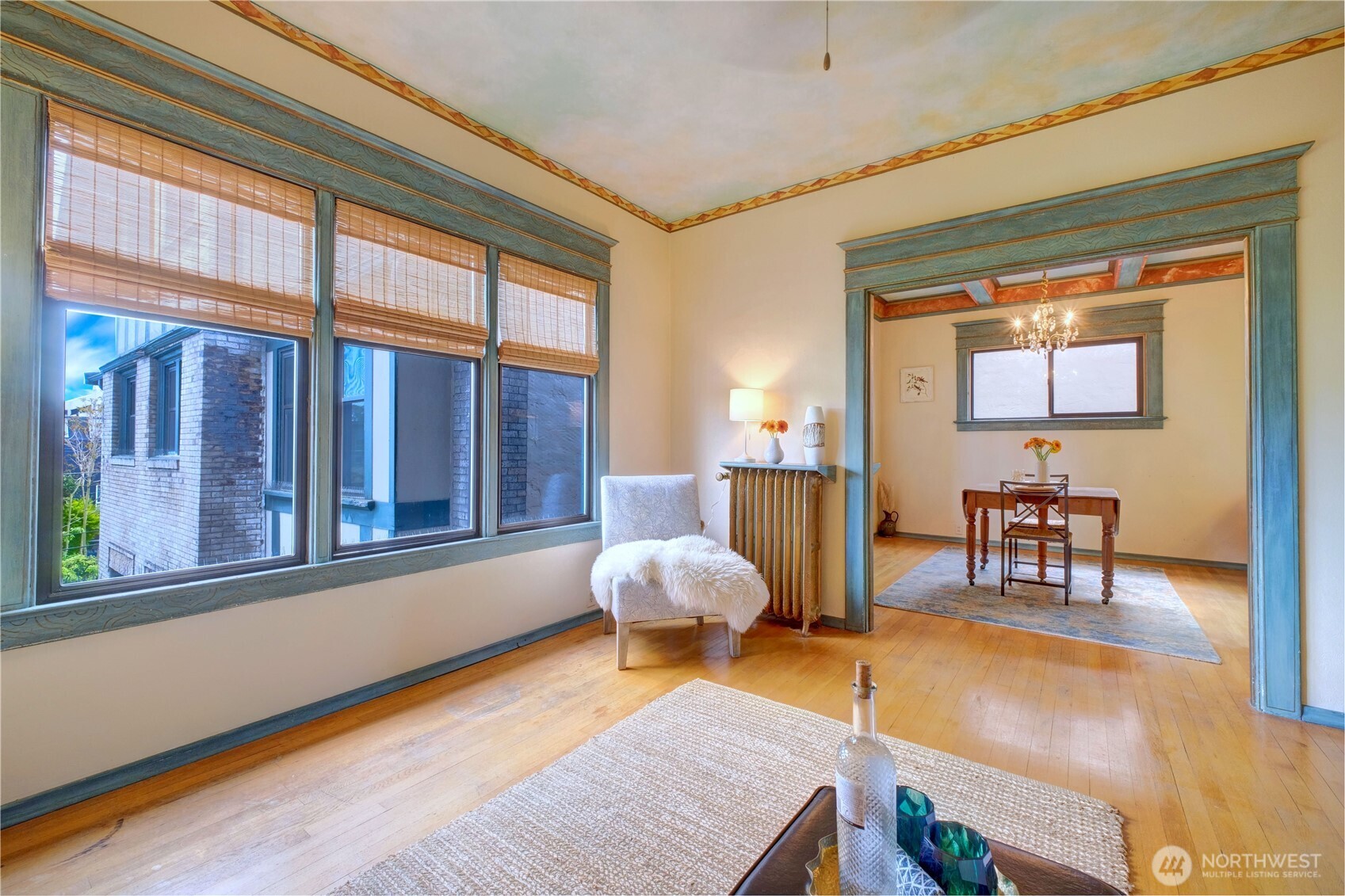 409 16th Avenue East, Unit 21 Seattle, WA 98112 - Photo 11 of 25 a living room filled with furniture and a large window