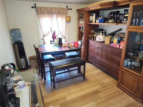 a view of a workspace with furniture and toys