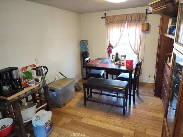a view of a livingroom with furniture and a window