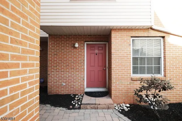a front view of a house with a shower