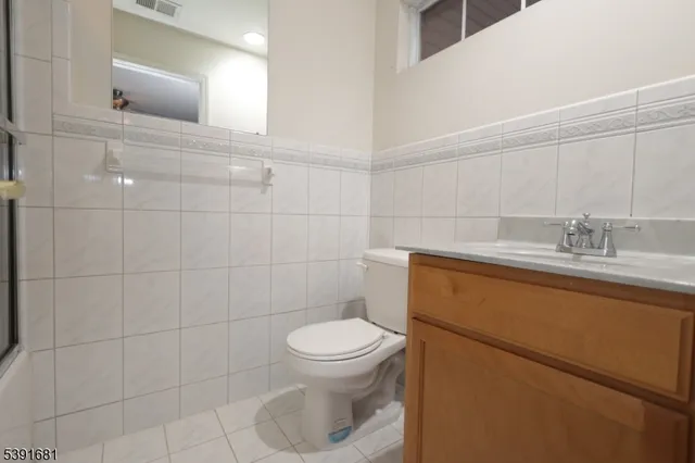 a view of a front of house with a balcony