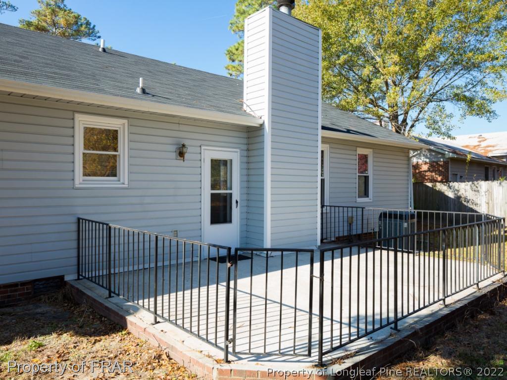 923 Rim Road Fayetteville, NC 28314 - Photo 21 of 21 a view of a house with a wooden fence