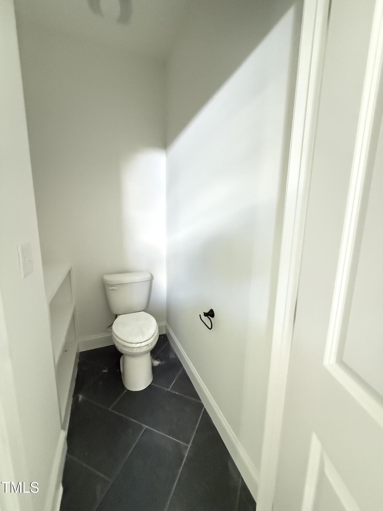 6930 Fire Tower Road Spring Hope, NC 27882 - Photo 17 of 33 a bathroom with a toilet and a shower