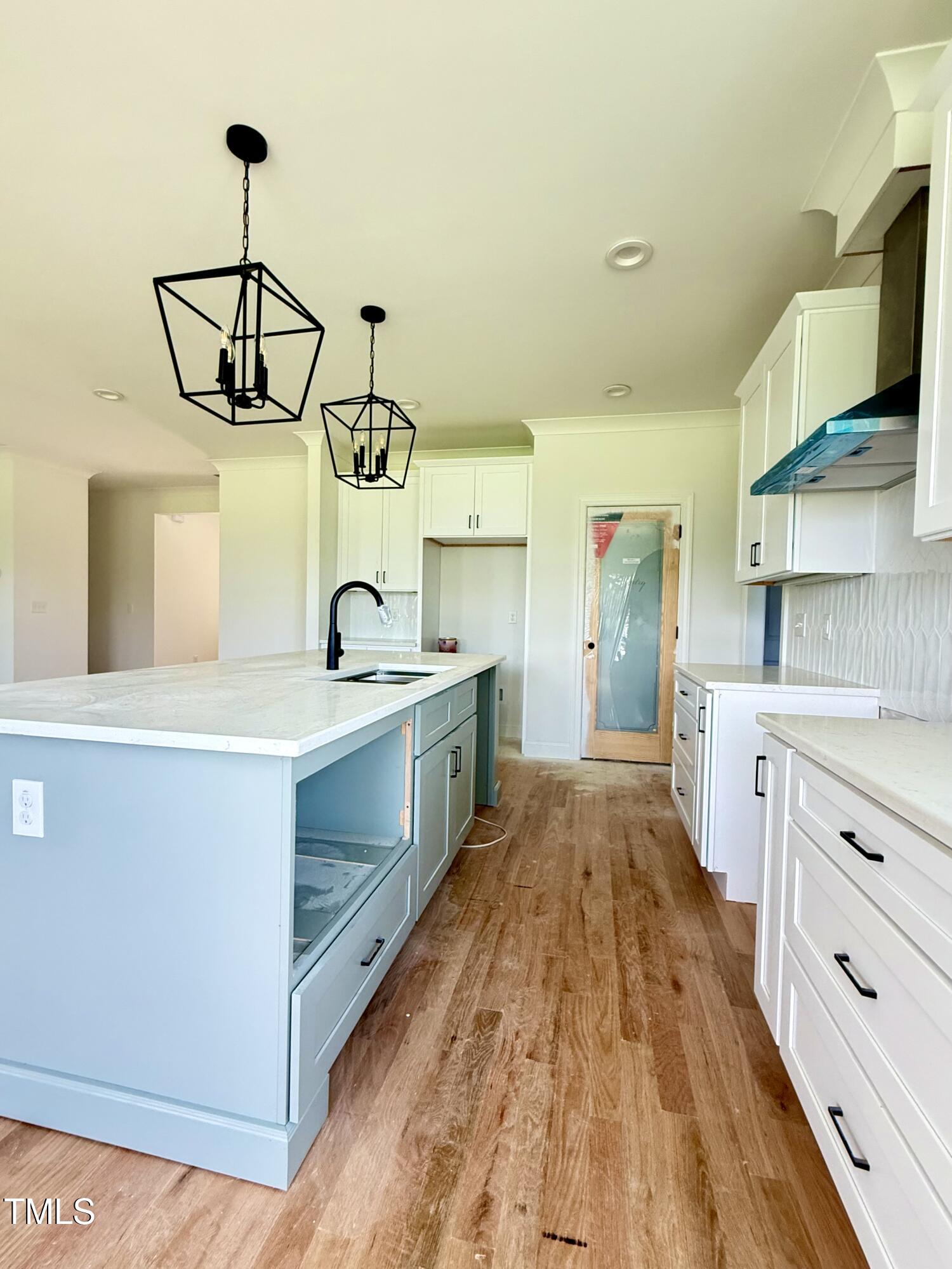 6930 Fire Tower Road Spring Hope, NC 27882 - Photo 5 of 33 a kitchen with a sink appliances and cabinets