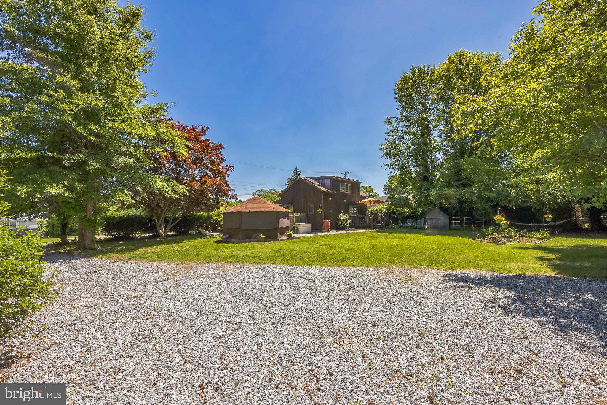 69 Oberlin Road Pennsville, NJ 08070 - Photo 20 of 21 a view of pool and trees in the background