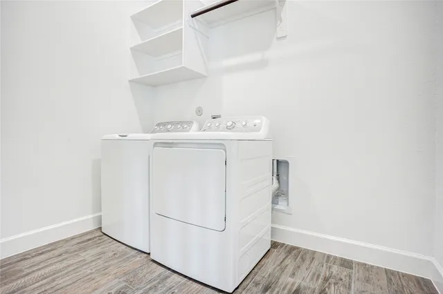 a bathroom with a toilet sink and a mirror