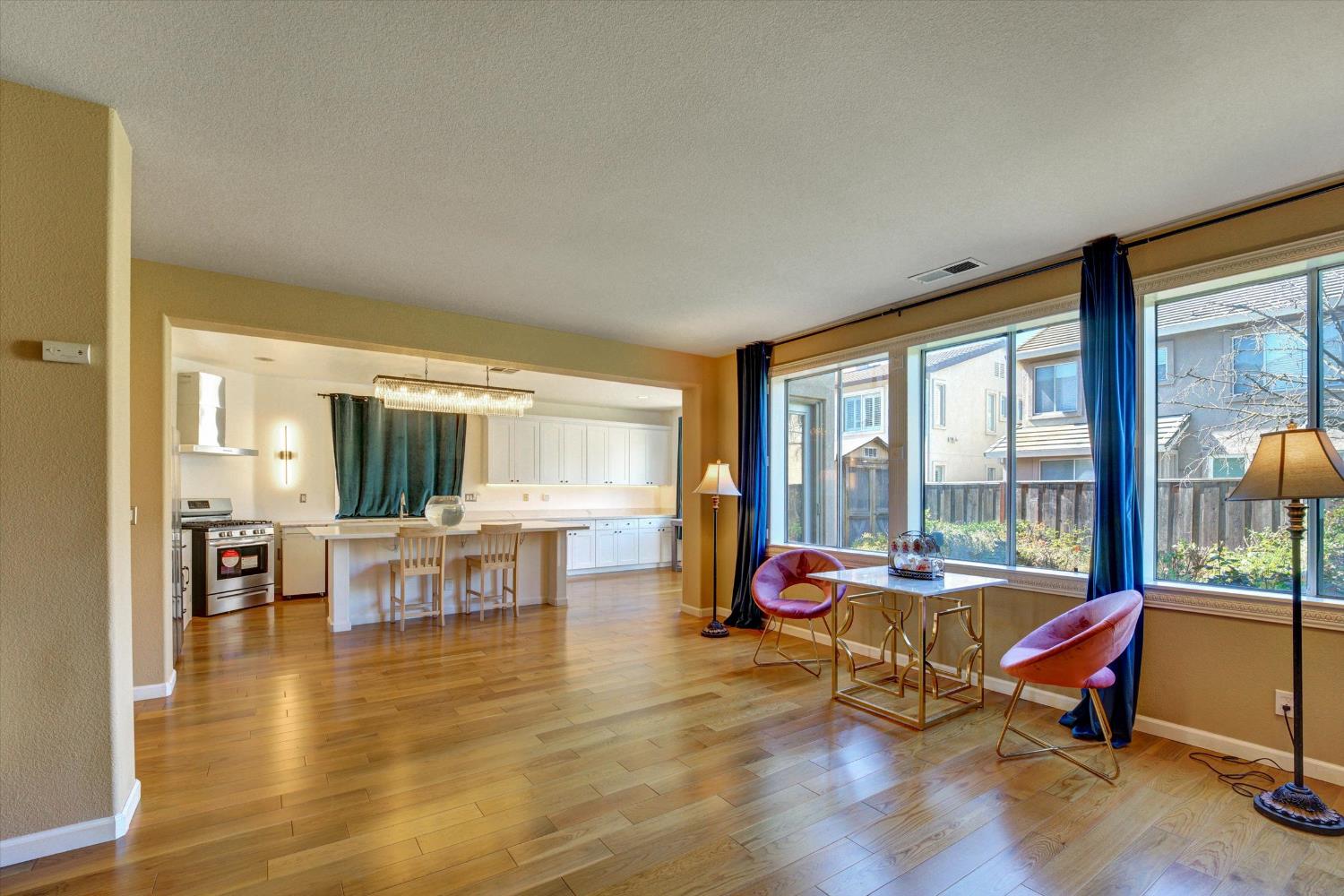 30253 Oakbrook Road Hayward, CA 94544 - Photo 11 of 49 a living room with furniture and floor to ceiling windows
