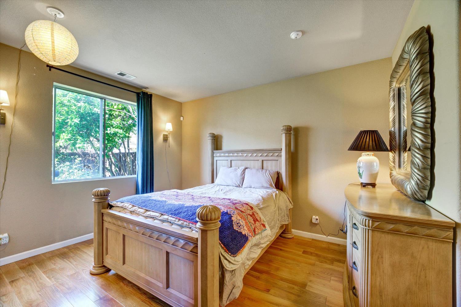 30253 Oakbrook Road Hayward, CA 94544 - Photo 14 of 49 a bedroom with a bed and window