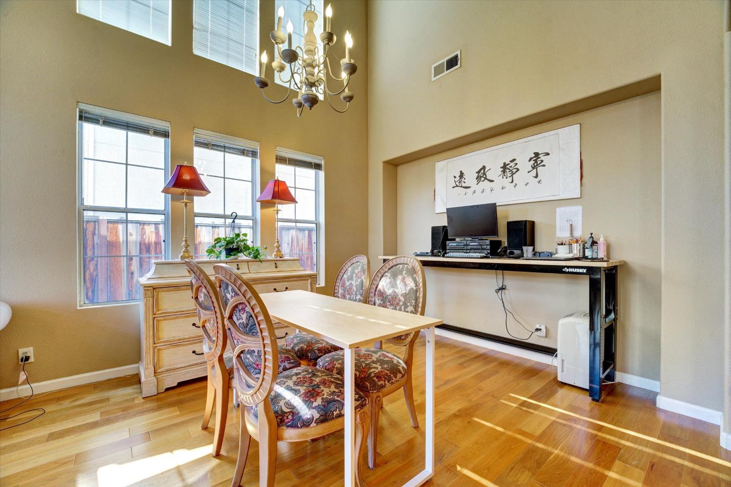 30253 Oakbrook Road Hayward, CA 94544 - Photo 25 of 49 a view of a dining room with furniture and a chandelier