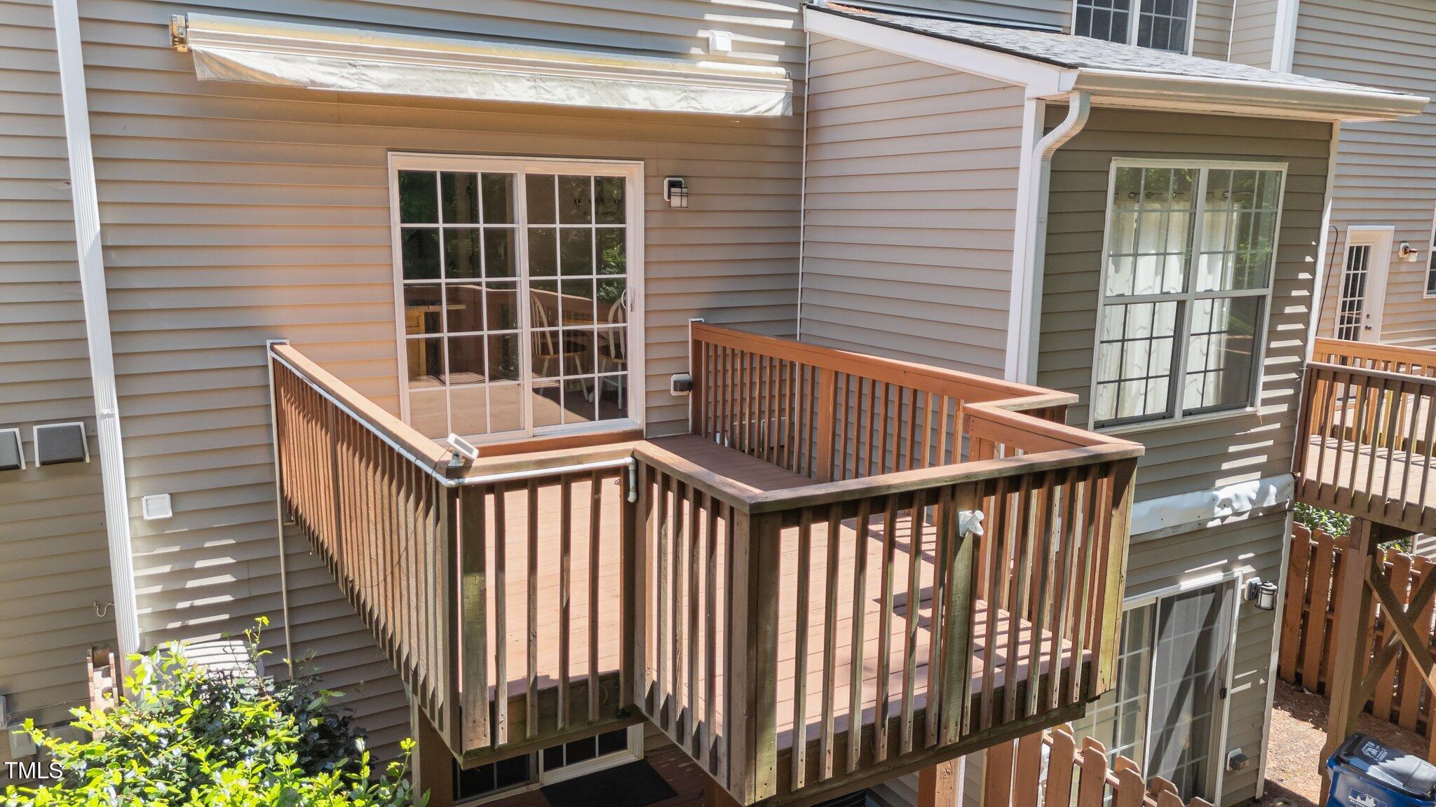 5310 Echo Ridge Road Raleigh, NC 27612 - Photo 14 of 29 a view of staircase with railing and white walls