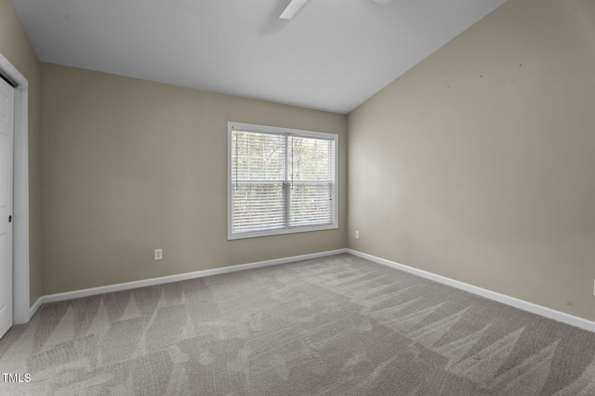 5310 Echo Ridge Road Raleigh, NC 27612 - Photo 15 of 29 an empty room with windows