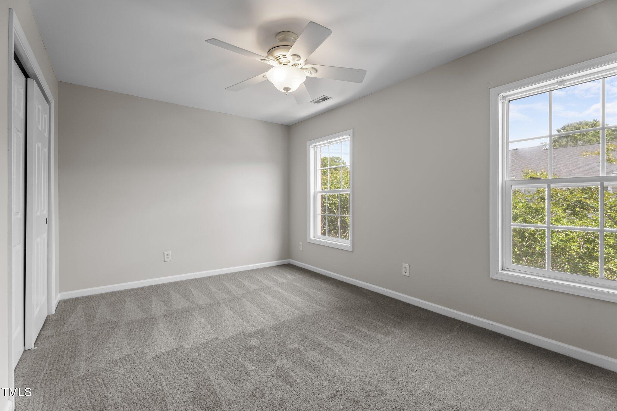 5310 Echo Ridge Road Raleigh, NC 27612 - Photo 19 of 29 a view of an empty room with a window