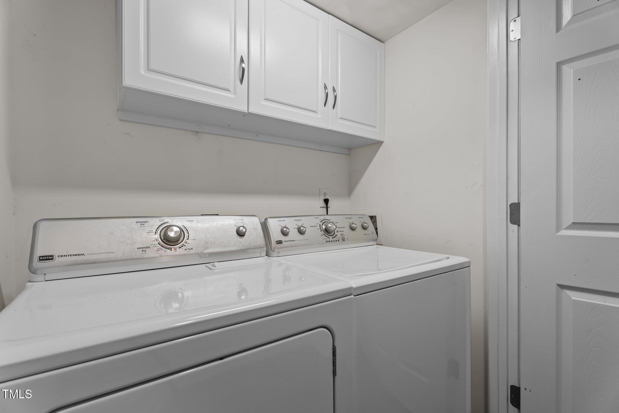 5310 Echo Ridge Road Raleigh, NC 27612 - Photo 24 of 29 a close view of utility room with washer and dryer