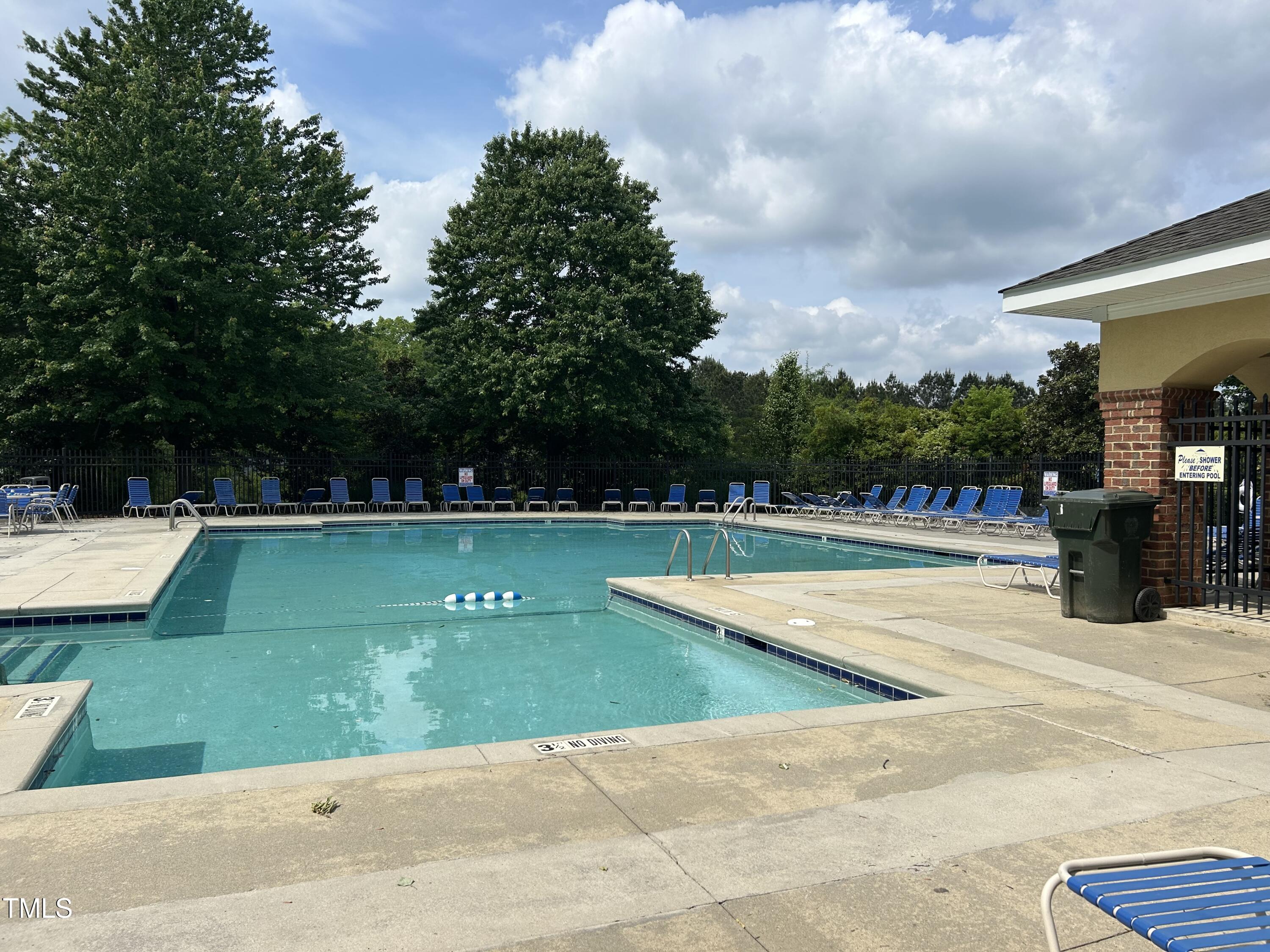 5310 Echo Ridge Road Raleigh, NC 27612 - Photo 28 of 29 a view of swimming pool with a yard
