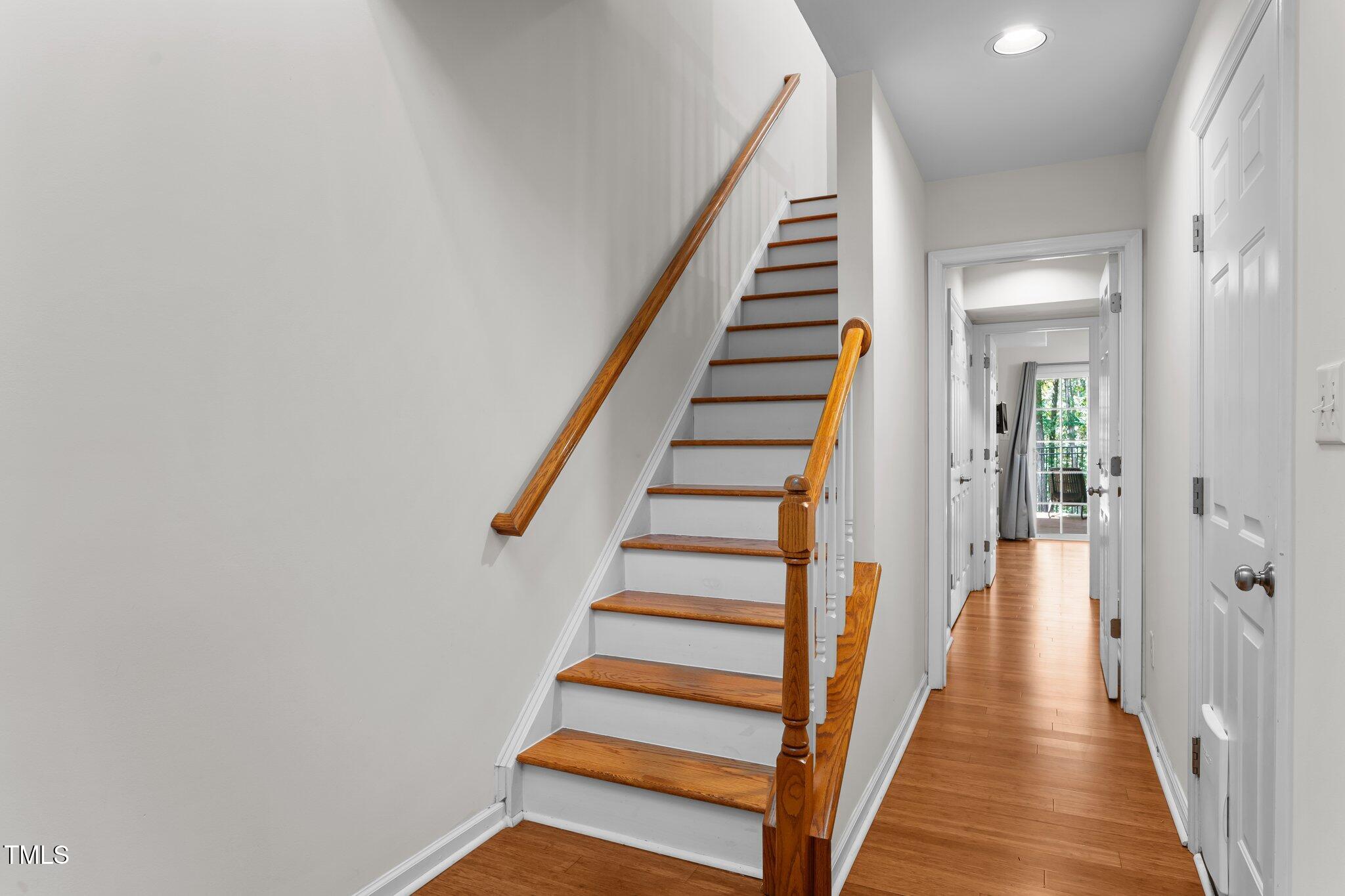 5310 Echo Ridge Road Raleigh, NC 27612 - Photo 4 of 29 a view of a hallway with wooden floor and entryway