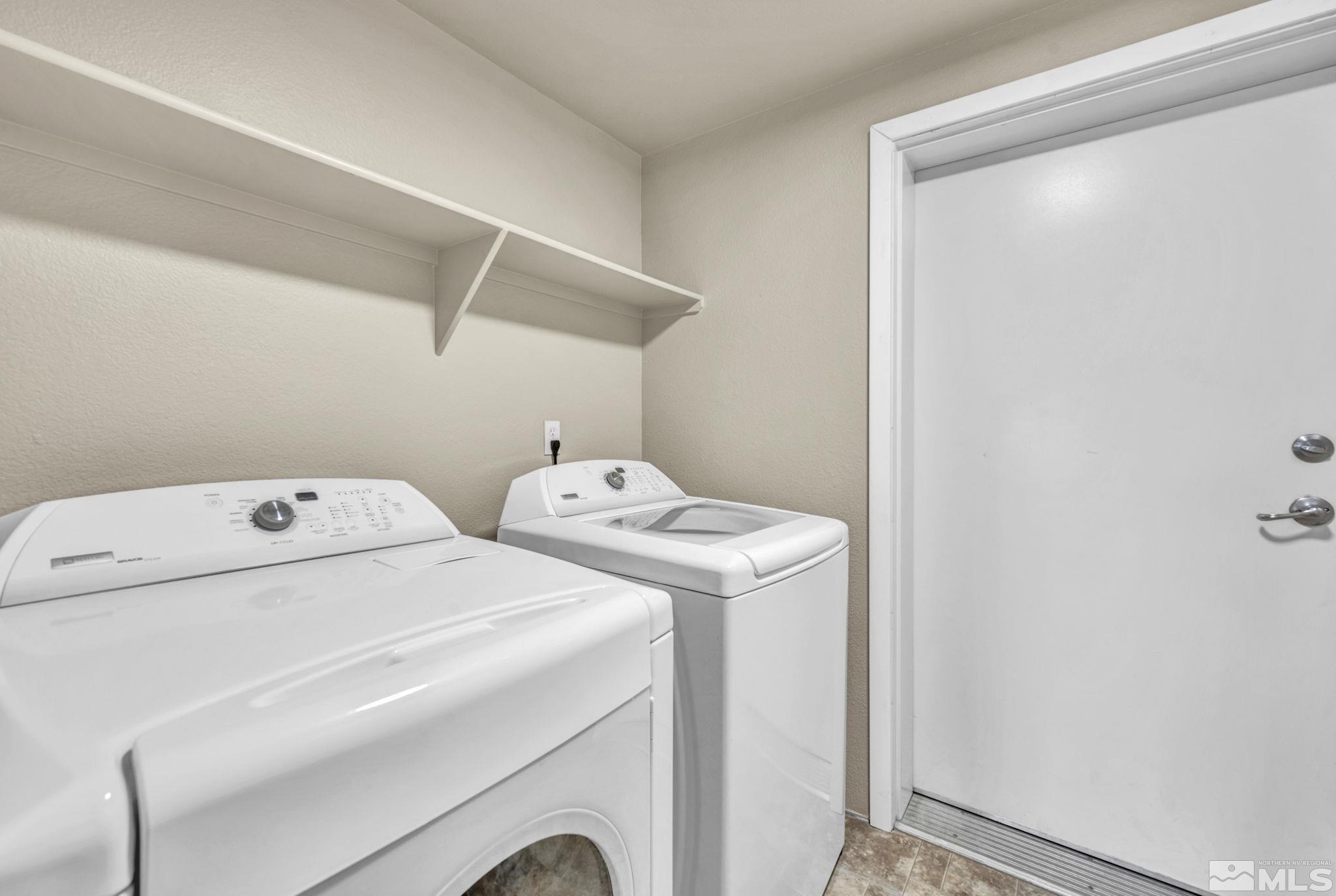 1325 South Meadows Parkway, Unit 412 Reno, NV 89521 - Photo 32 of 39 a utility room with dryer and washer