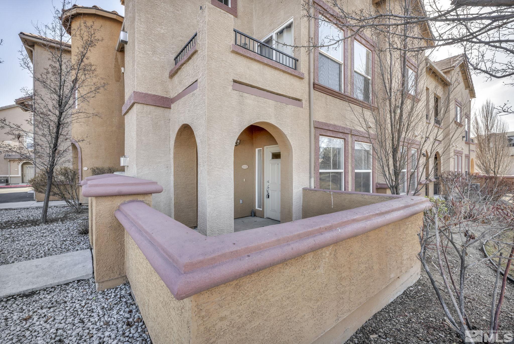 1325 South Meadows Parkway, Unit 412 Reno, NV 89521 - Photo 4 of 39 a view of front of a house with a yard