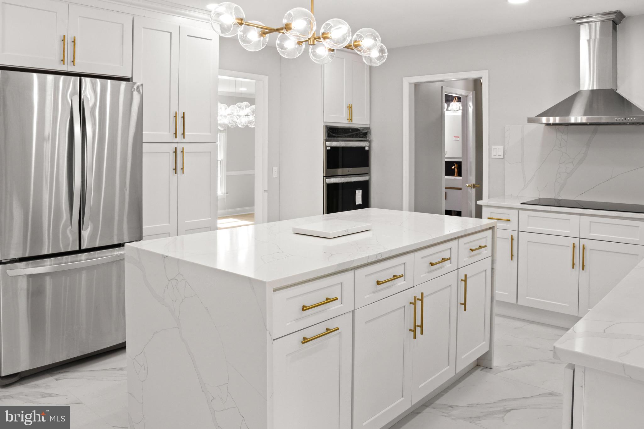 2154 Gorton Road Macungie, PA 18062 - Photo 11 of 49 a kitchen with white cabinets and stainless steel appliances