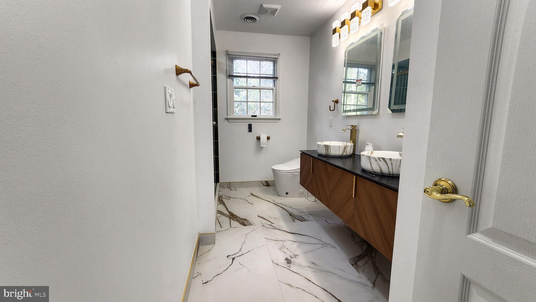 2154 Gorton Road Macungie, PA 18062 - Photo 30 of 49 a bathroom with sink and mirror