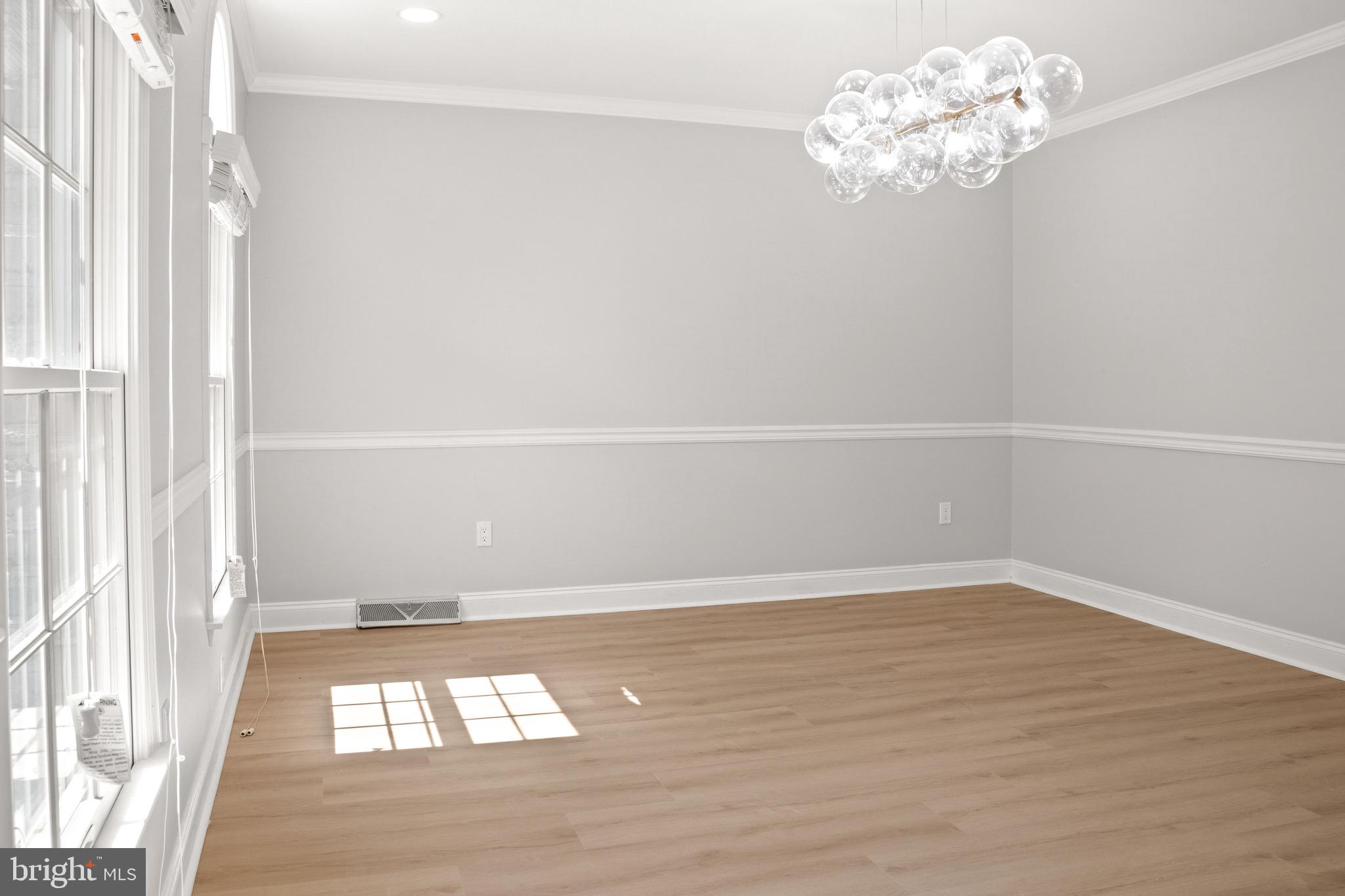 2154 Gorton Road Macungie, PA 18062 - Photo 8 of 49 a view of an empty room with wooden floor and a window