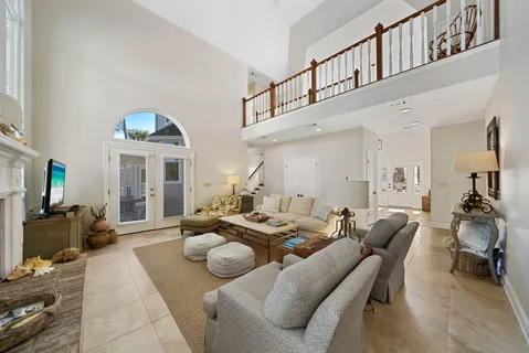 a white toilet sitting next to a bath tub shower