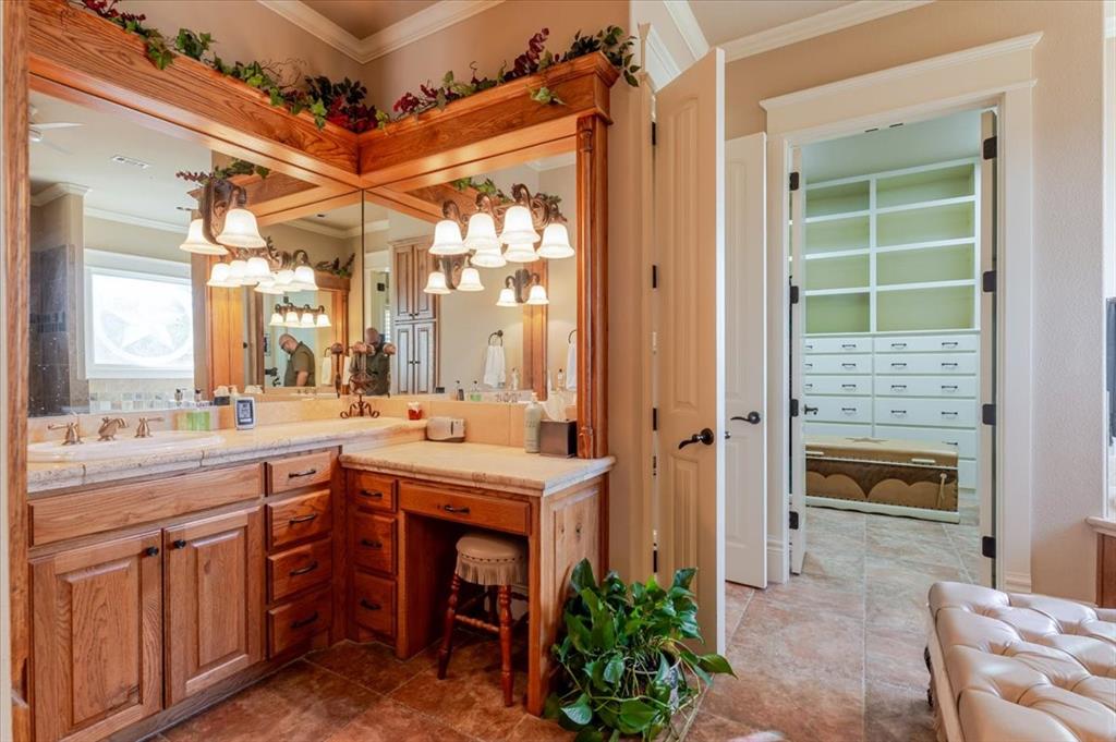 11918 Riek Road Krum, TX 76249 - Photo 17 of 39 a kitchen with a sink and cabinets