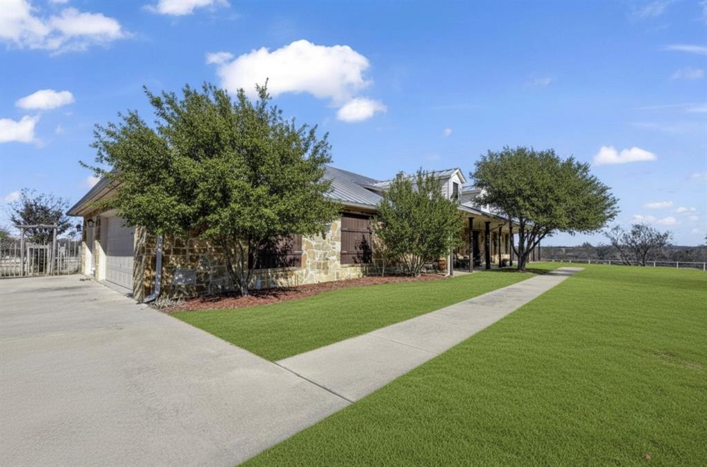 11918 Riek Road Krum, TX 76249 - Photo 6 of 39 a view of a park with large trees
